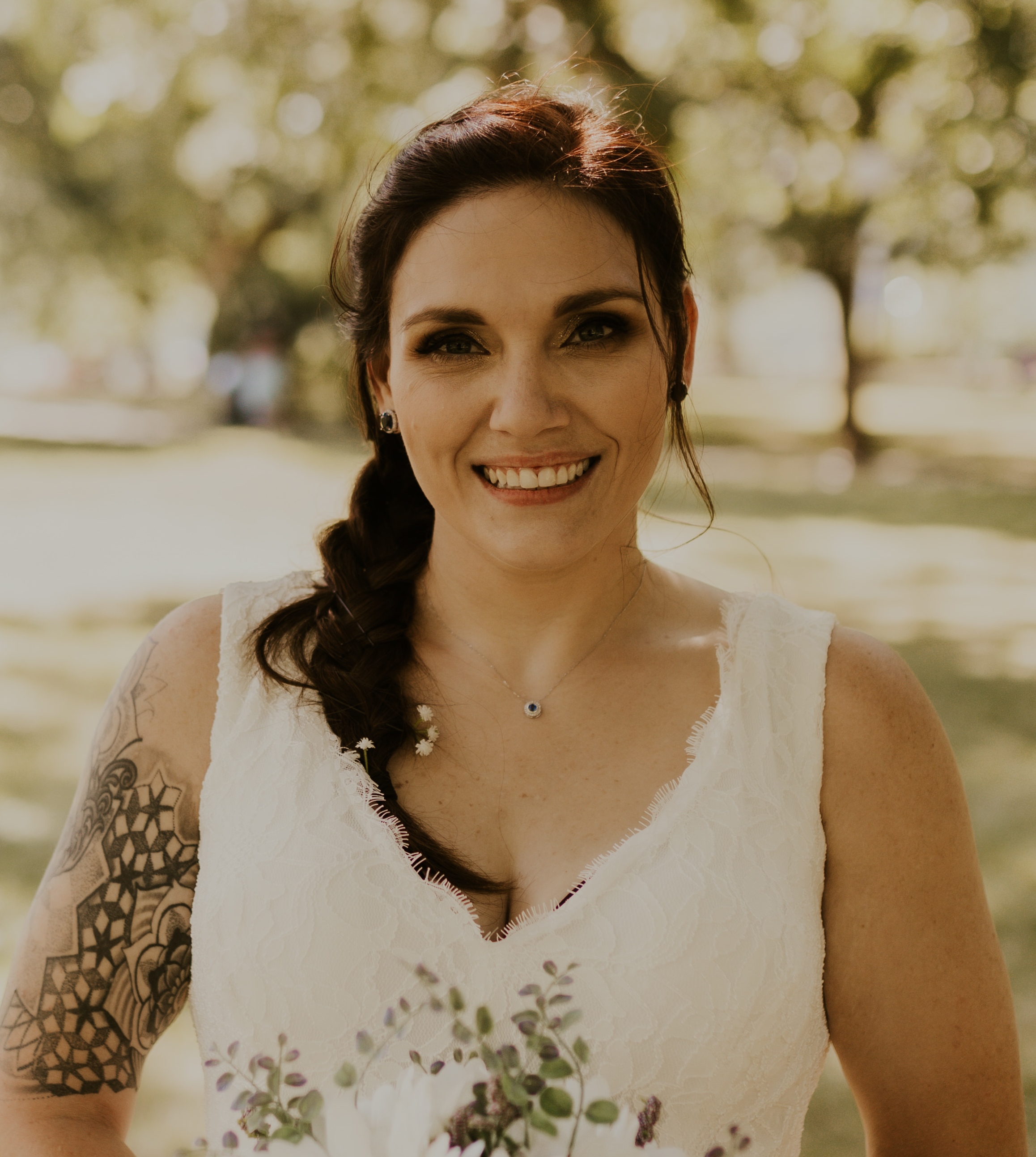 Portrait of a woman smiling outdoors